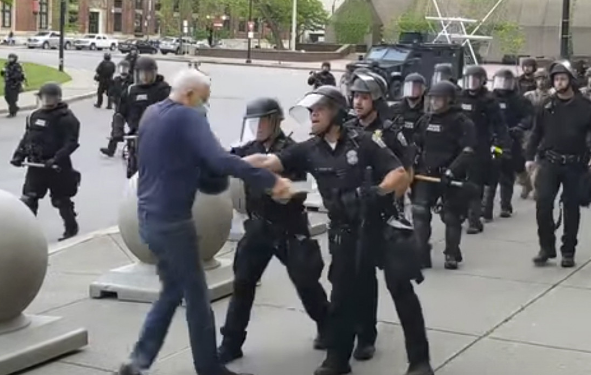 Buffalo police : Officials suspended in the wake of pushing 75-year-old to the ground, splitting his skull 